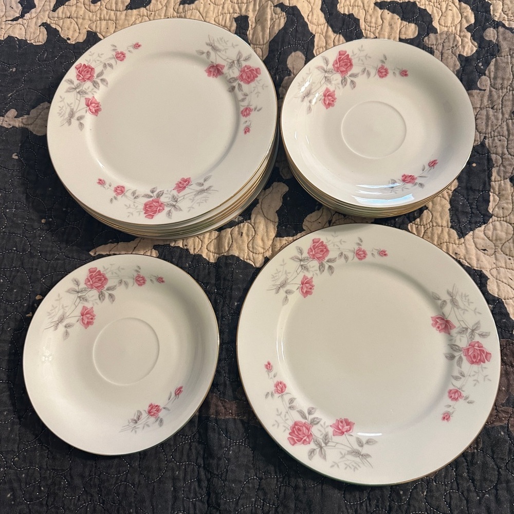 Hebei Porcelain rose print tea saucers and salad plates. There are 7 of each.